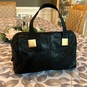 Vintage classic black leather Toni satchel bag with goldstone accents.